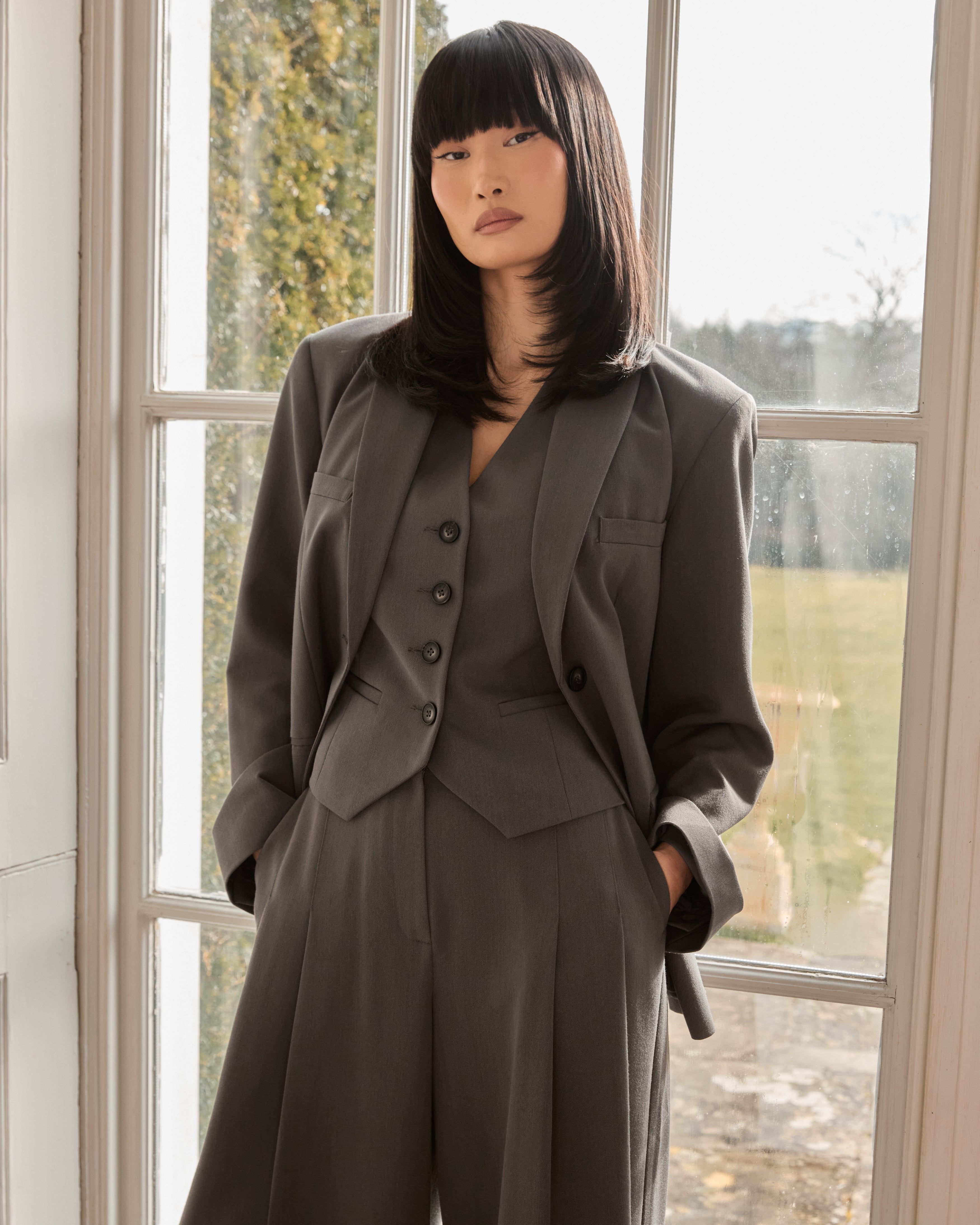 a woman in a suit