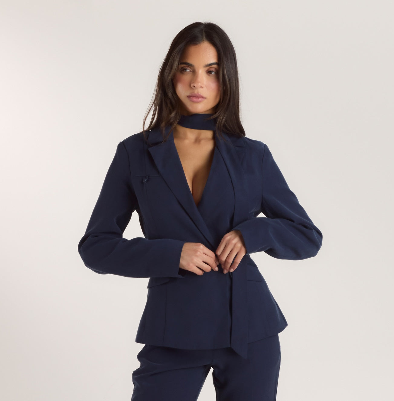 a woman in a blue suit