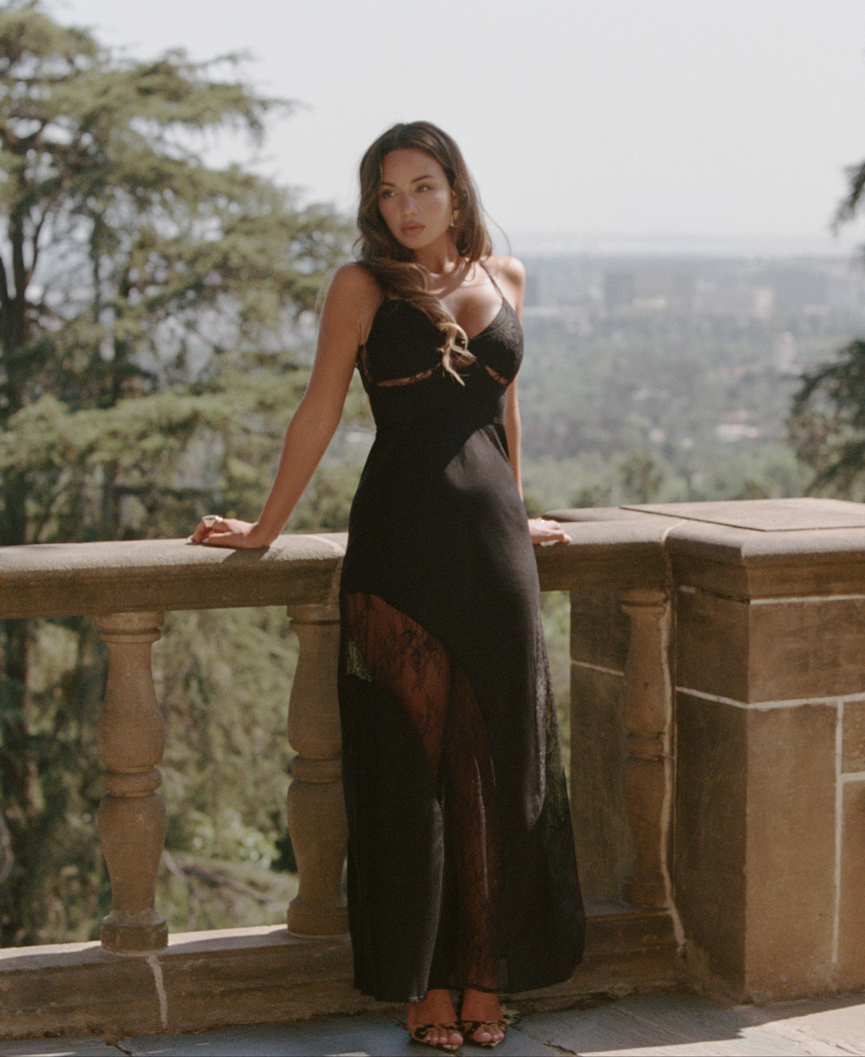a woman in a black dress