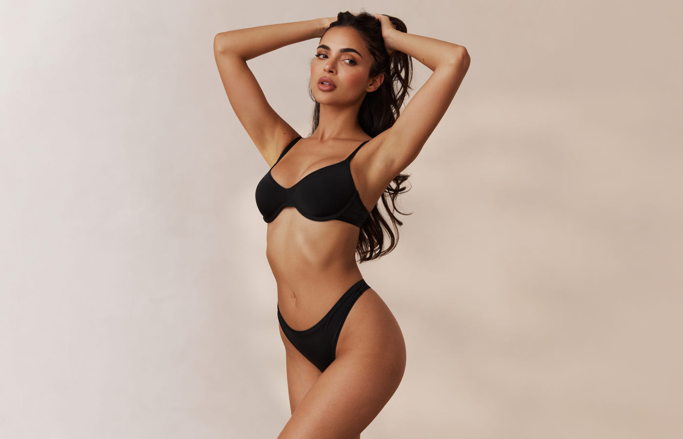 https://us.lounge.com/cdn/shop/files/Black_Barely_There_Plunge_Underwear_Leidy_Barely_There_2024_5_1_copy.jpg?crop=center&format=webp&height=900&quality=80&v=1709540048&width=1400