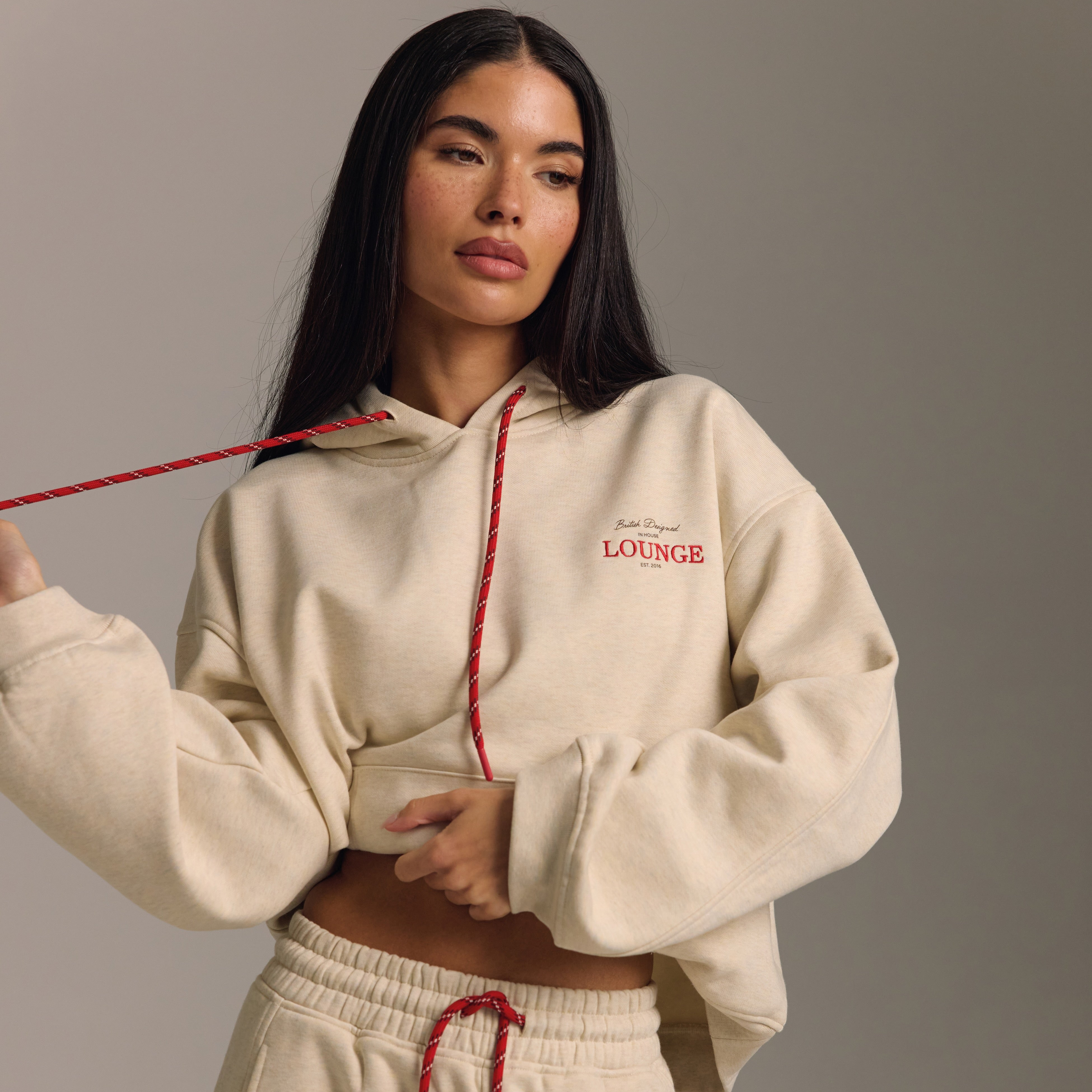 a woman in a white sweater