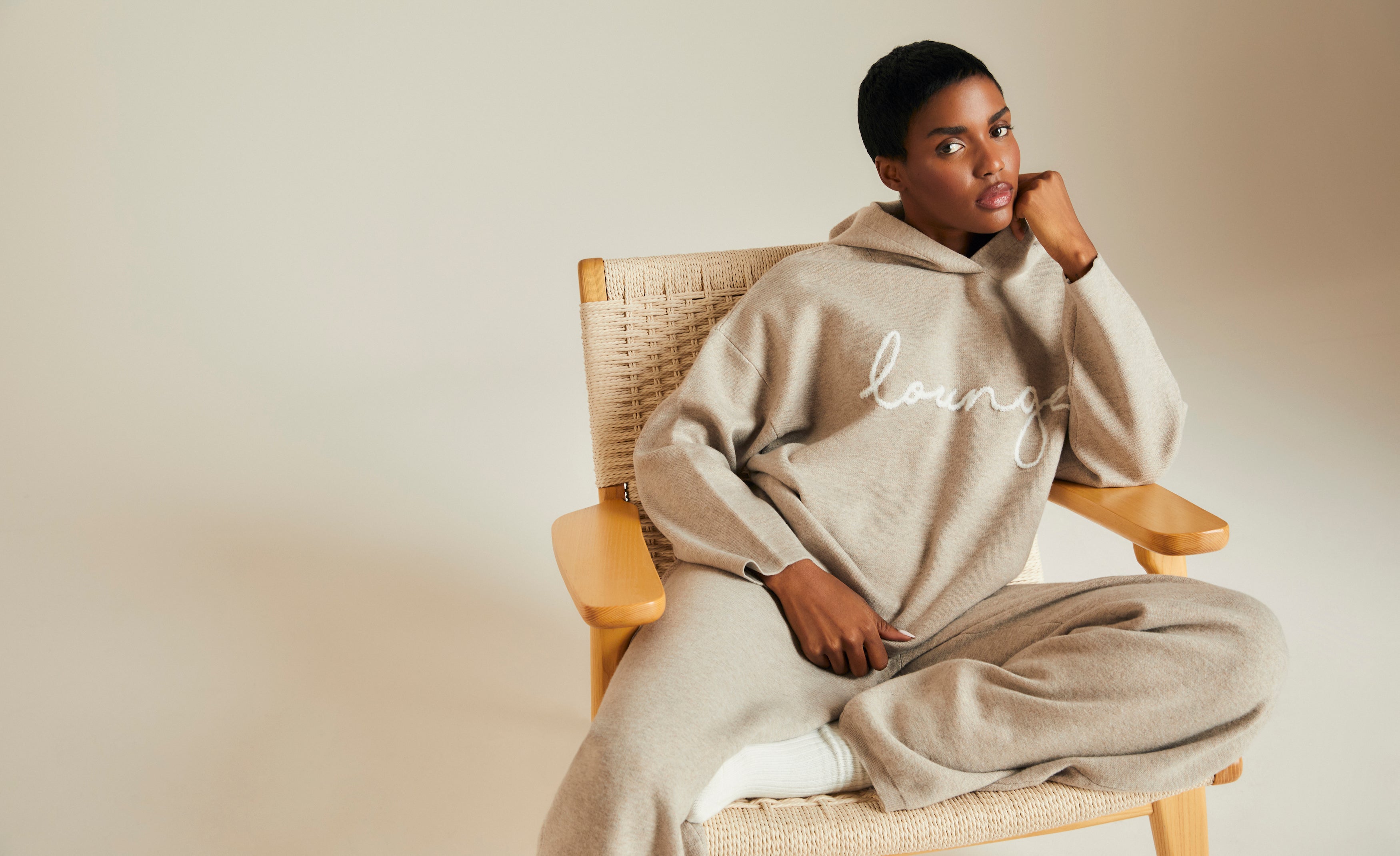 a woman sitting in a chair