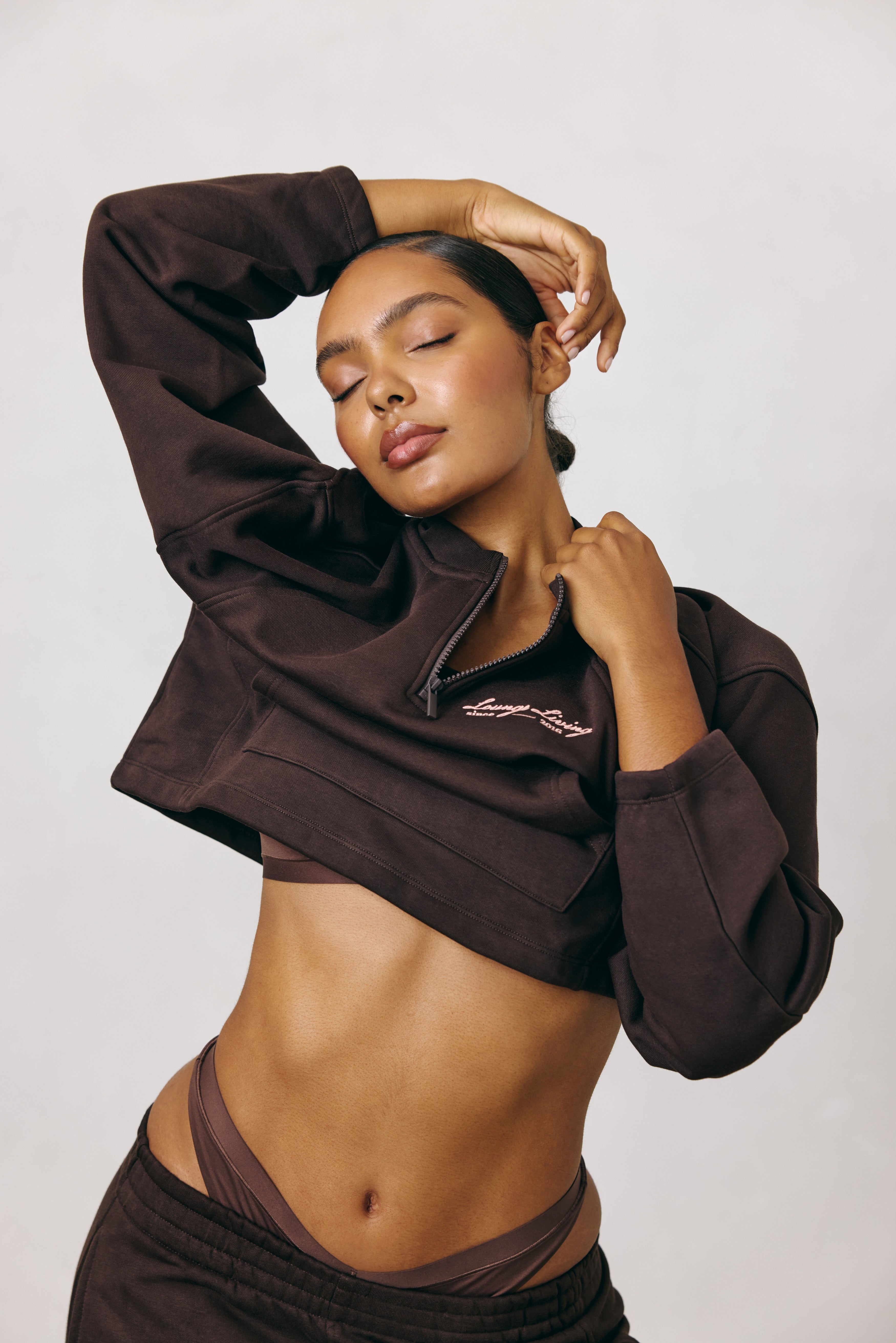 a woman with her eyes closed