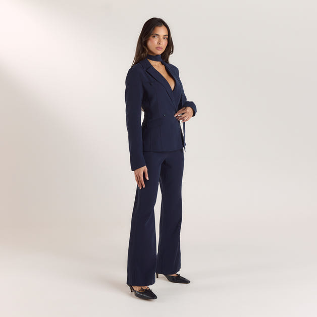 a woman in a blue suit