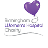 a purple heart shaped balloon with a cross on it