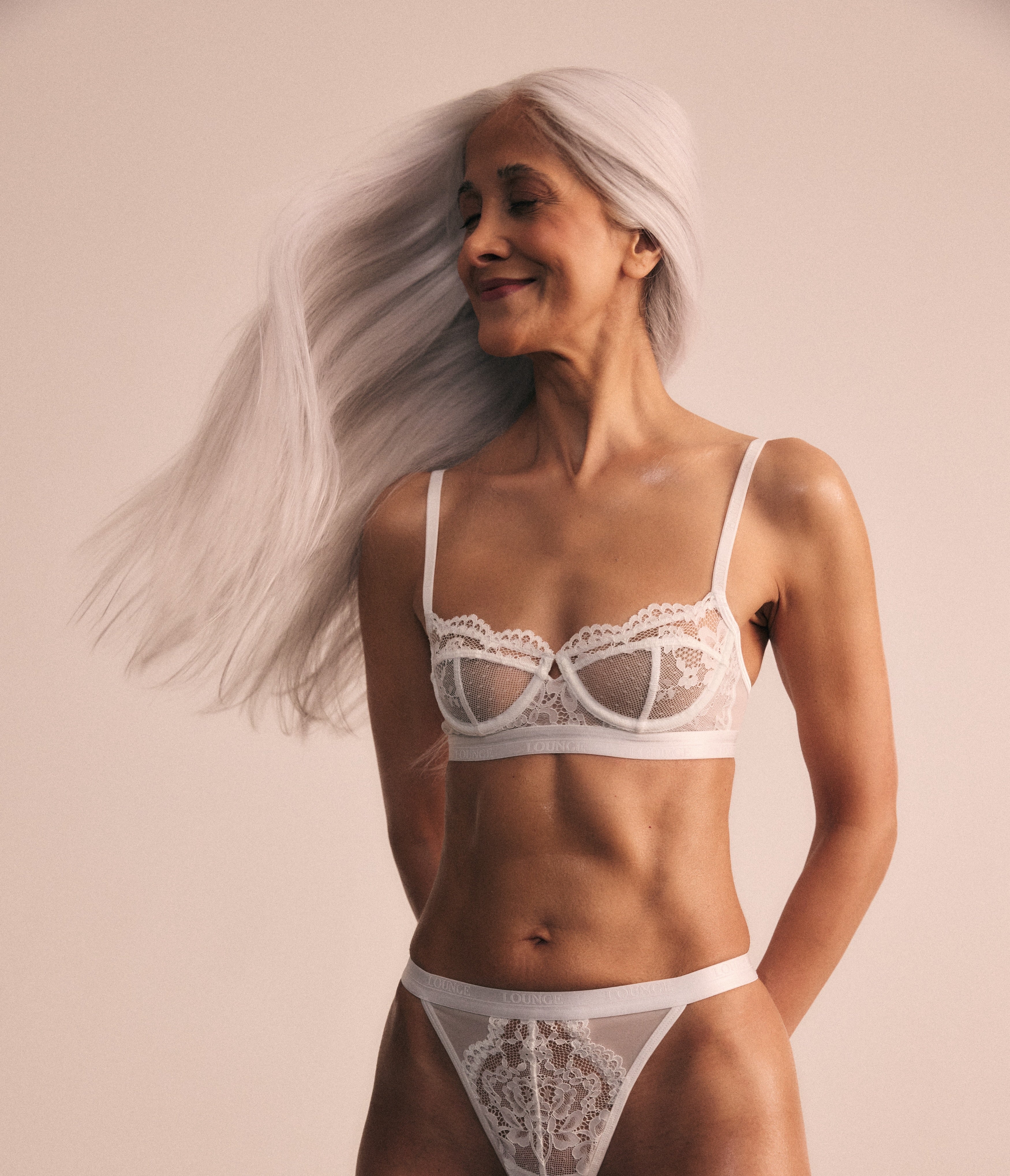 a woman in white lingerie